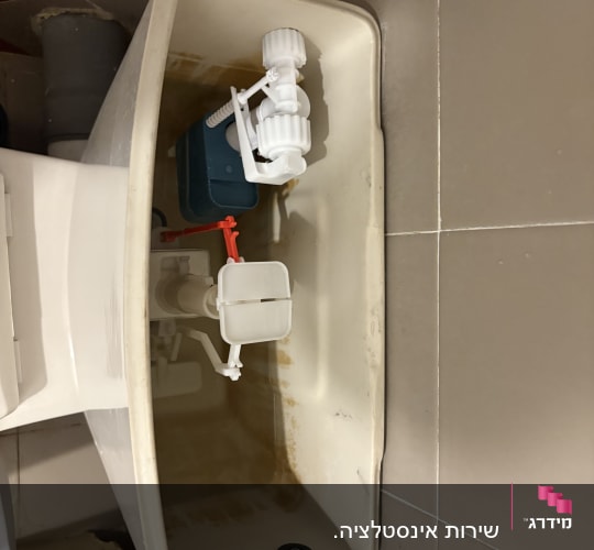 מיכל אסלה פתוח עם מנגנון פנימי